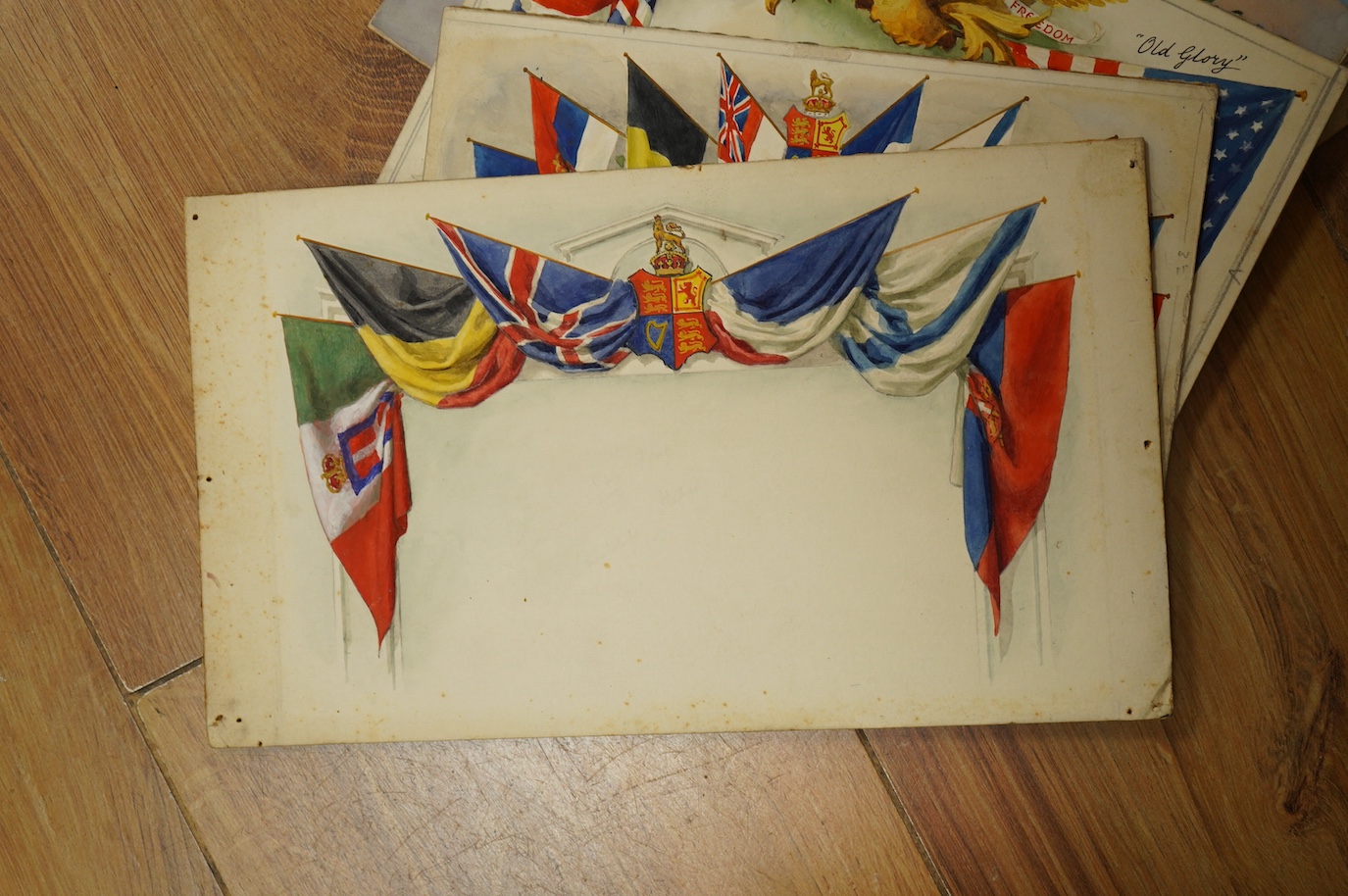 Charles Thomas Howard (1865–1942), nine original watercolours for patriotic postcard designs, WWI Flags of the Allied Nations, unframed, largest 14 x 23cm. Condition - fair